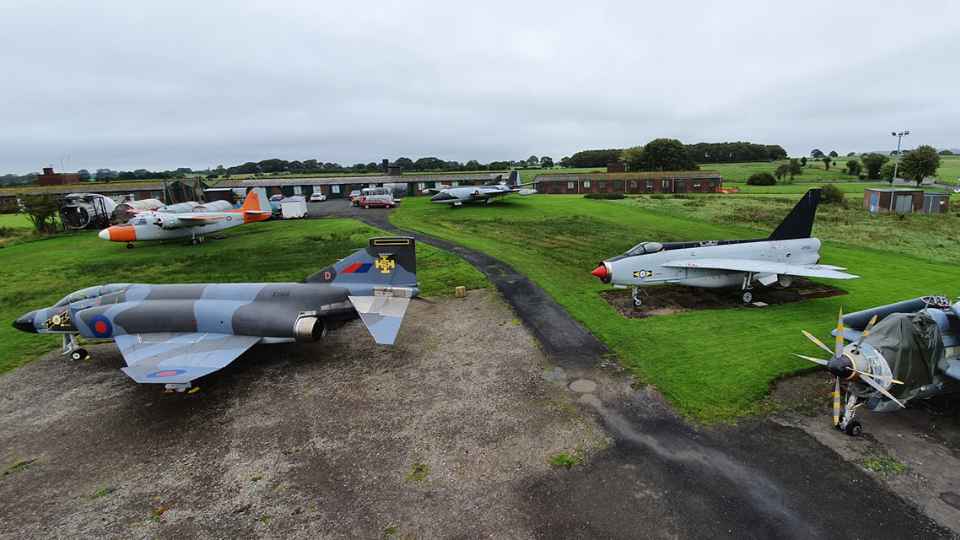 A drone shot of the outside static aircraft on display at the museum.