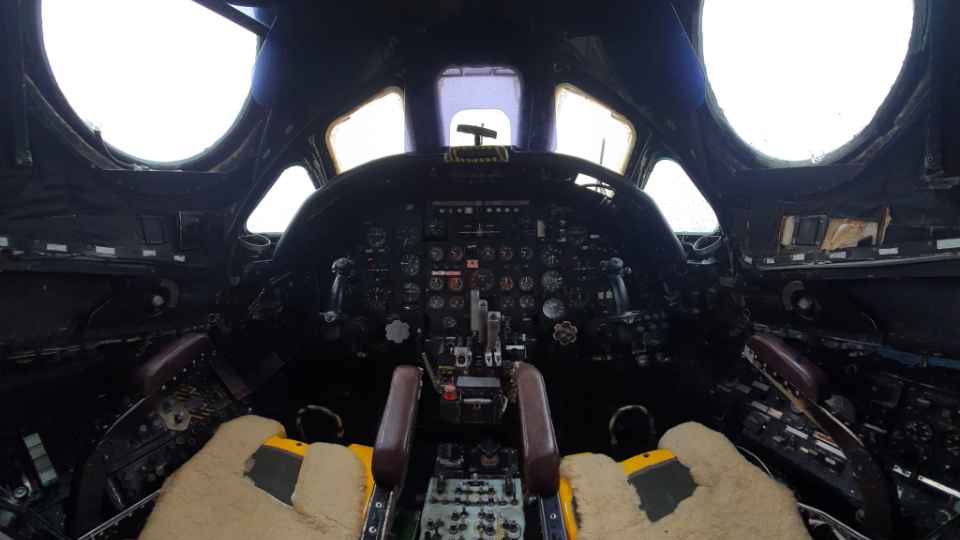 An interior view of the Vulcan bomber cockpit, looking towards the main instrument panel.